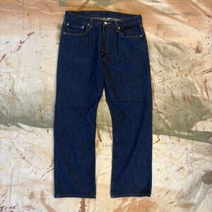 Dark wash Levi's 501 button butterfly jeans Measure 36x30